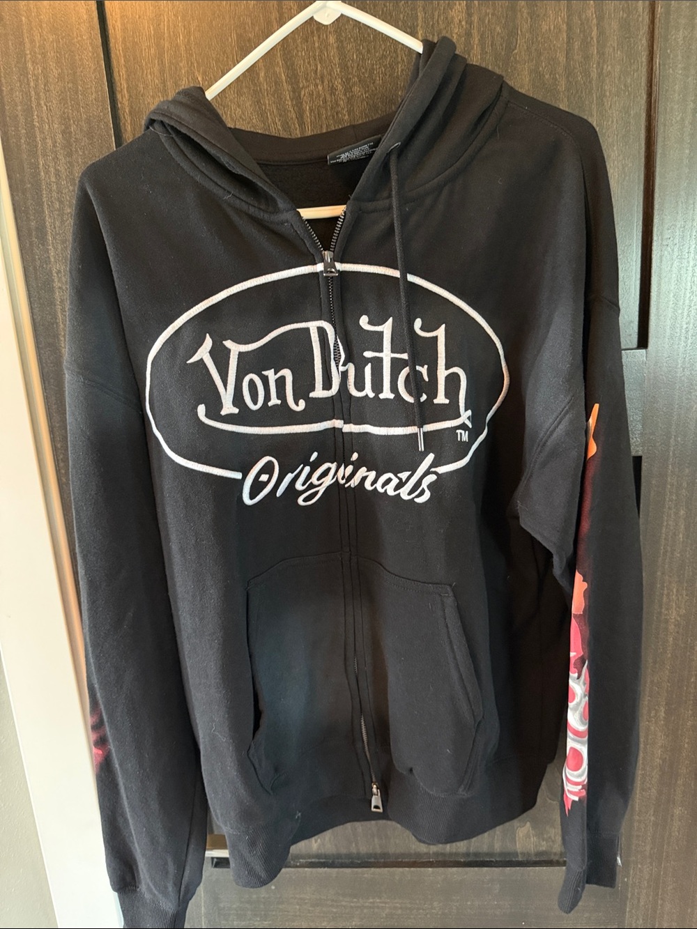 Von Dutch Black Zip Hoodie with White Logo and Red-Orange Sleeve Graphics